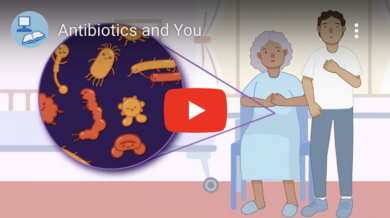 Video still. Illustration. Two people. A circle shows microbes inside one person's stomach as though through a microscope