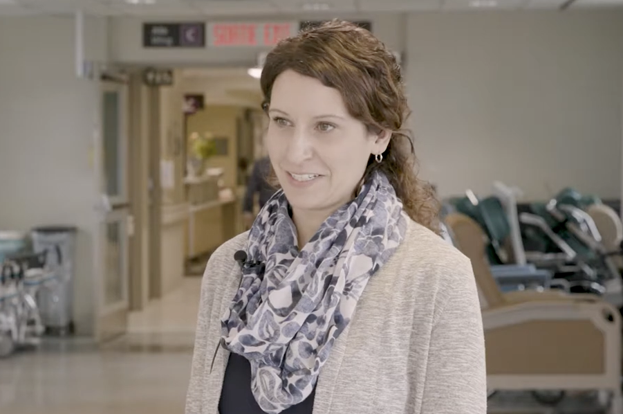 Woman in hospital hallway